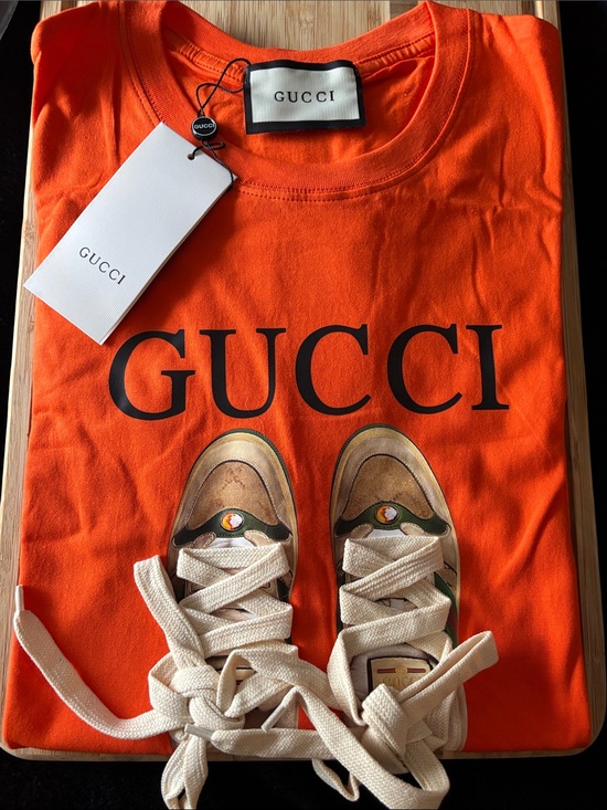 The Unbranded Brand Other - Brand New !!  Orange Tee with Sneaker Graphic Read 👇
